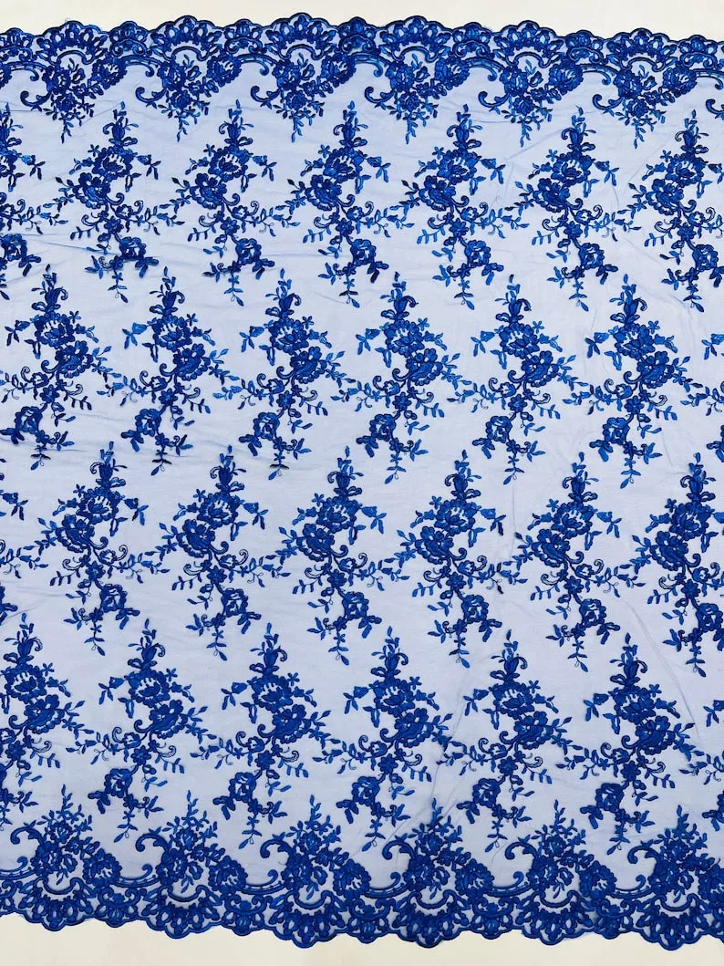 Corded embroider flowers on a mesh lace fabric-prom-sold by the yard.
