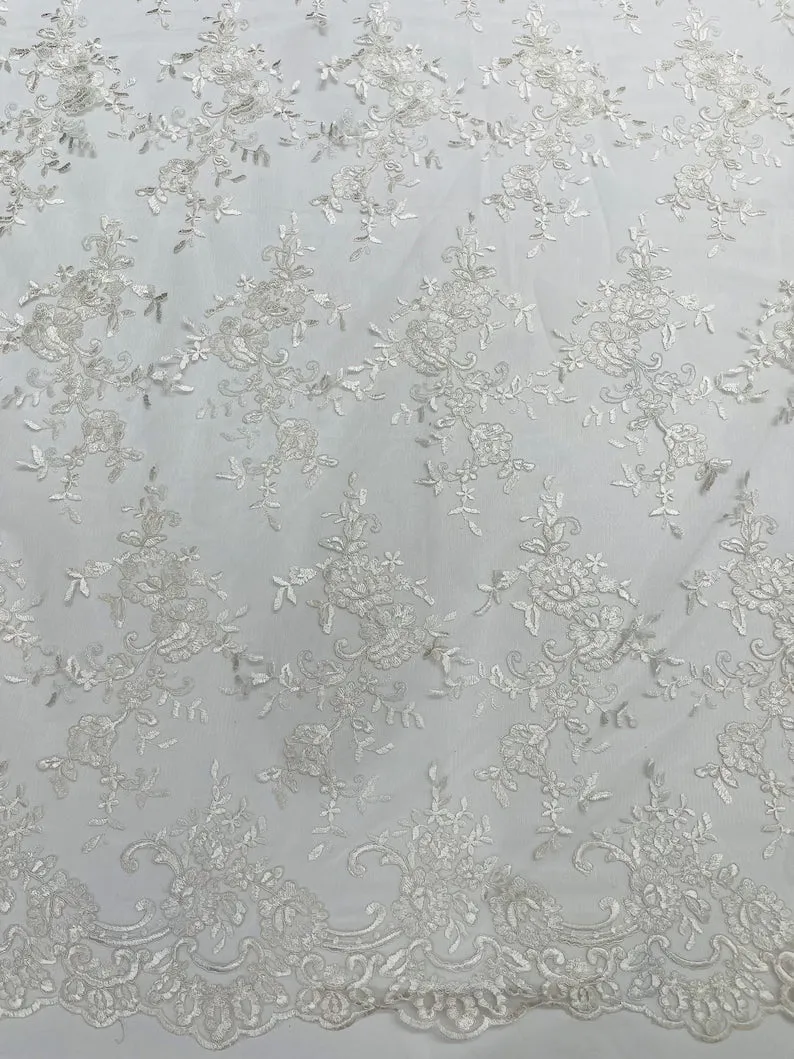 Corded embroider flowers on a mesh lace fabric-prom-sold by the yard.