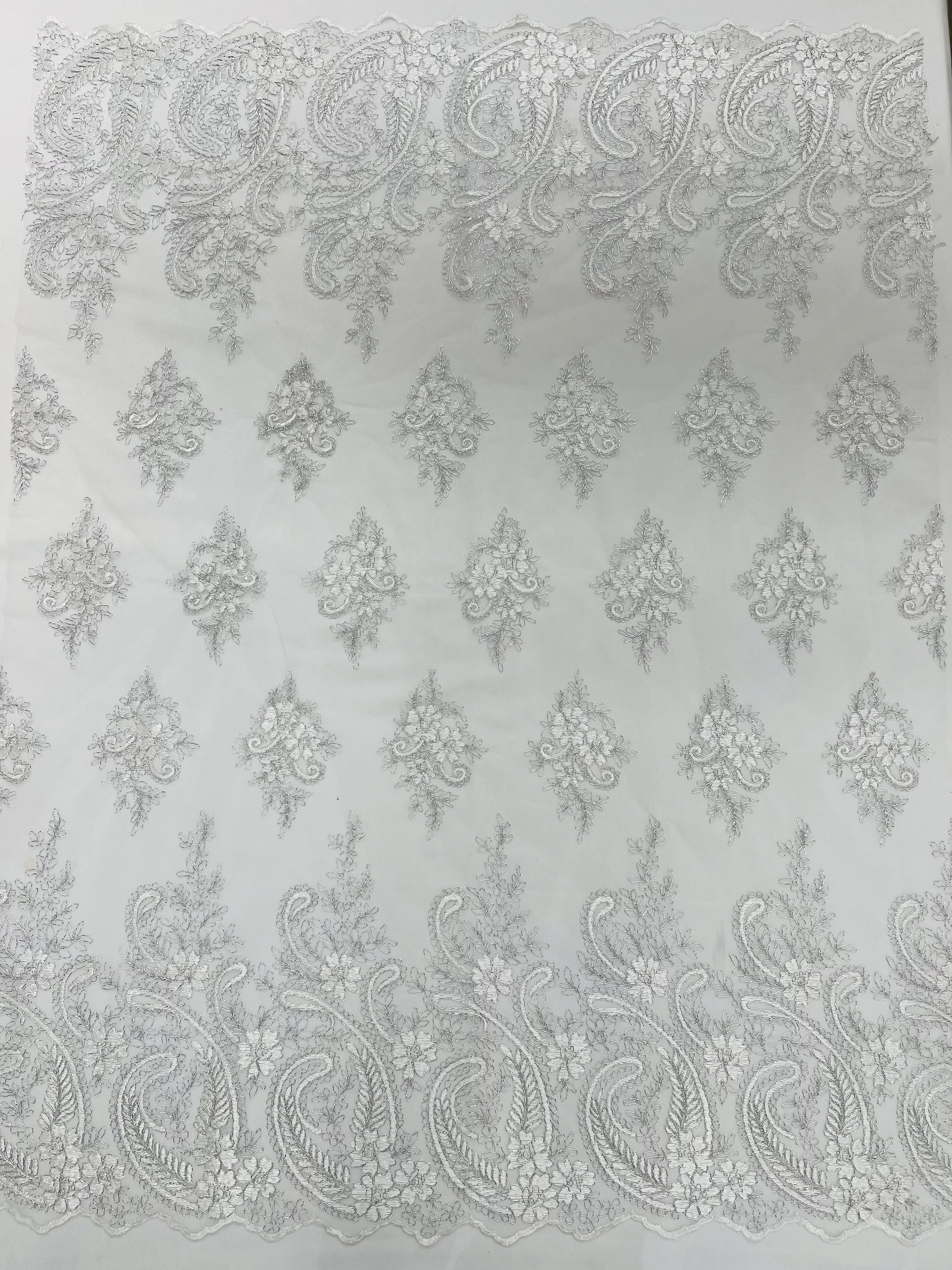 Metallic corded embroider flowers with Paisley design on a mesh lace fabric-prom